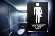 A sign protests H.B. 2, a North Carolina law governing which restrooms transgender people can use